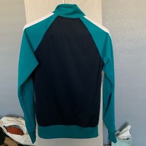 Nike Jackets & Coats - Nike NWOT turquoise navy track jacket Nike Jackets & Coats - Nike NWOT turquoise navy track jacket